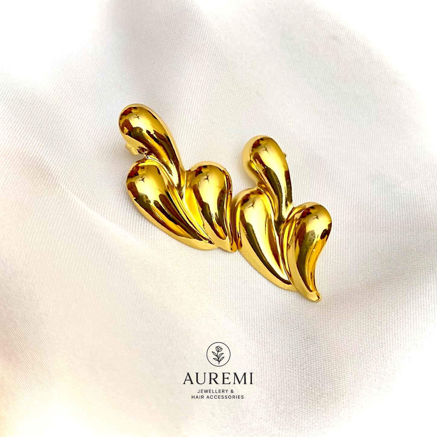 Luxe Statement with Anti-Tarnish Golden Waveflow Earrings